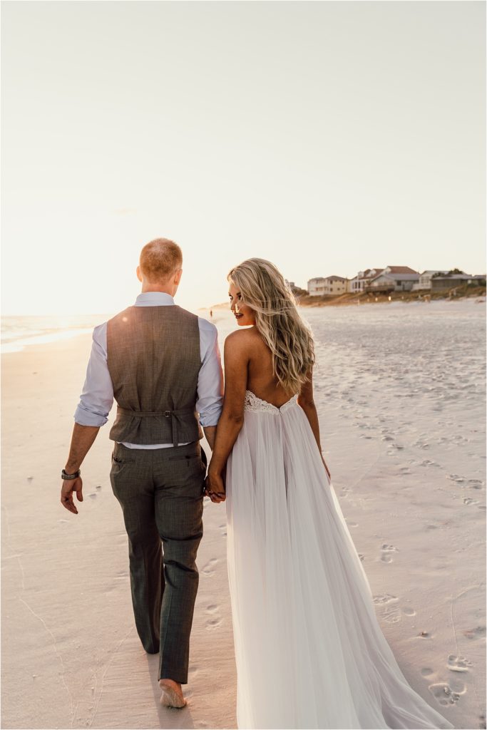 Inlet Beach Intimate Wedding Bride and Groom Walking Along Beach Photo