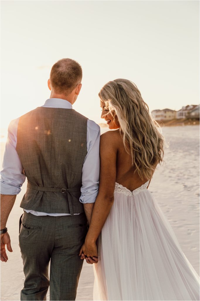 Inlet Beach Intimate Wedding Bride and Groom Holding Hands Photo