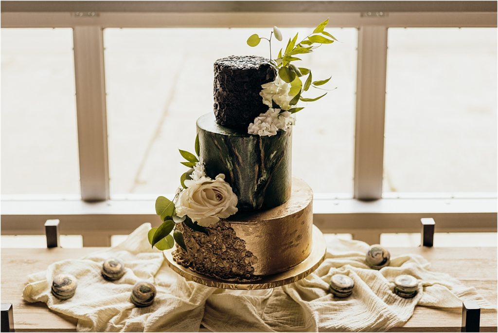 Perfect Plain Boho Wedding Inspiration Downtown Pensacola Wedding Green and Black Marble Wedding Cake Photos