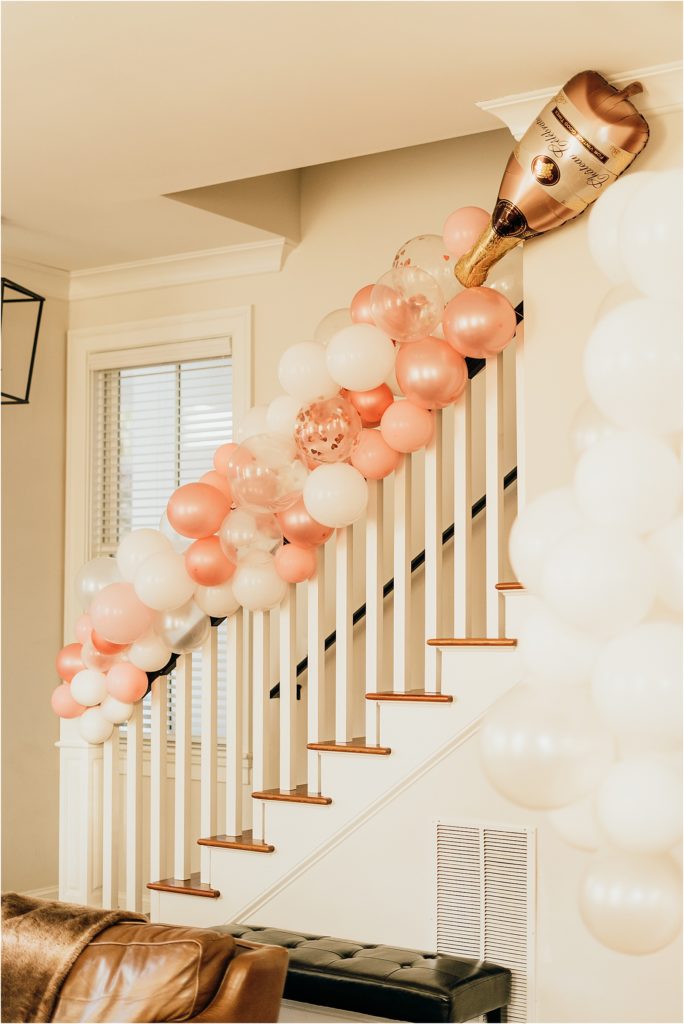 pink and white bachelorette party balloon garland