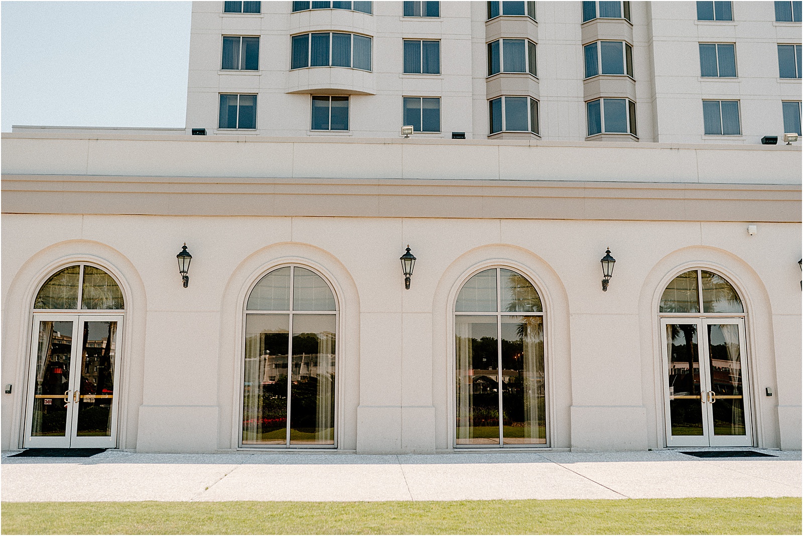 The Westin Savannah Harbor Lawn with arched windows from the ballroom