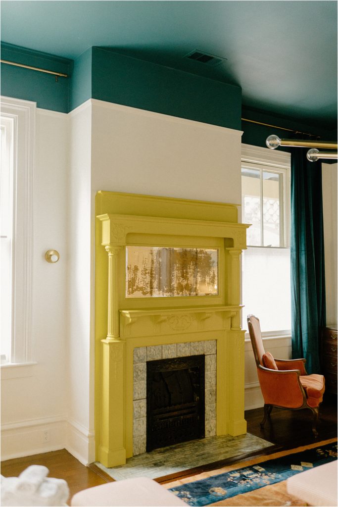 Gingerbread House Wedding Venue bright green fireplace